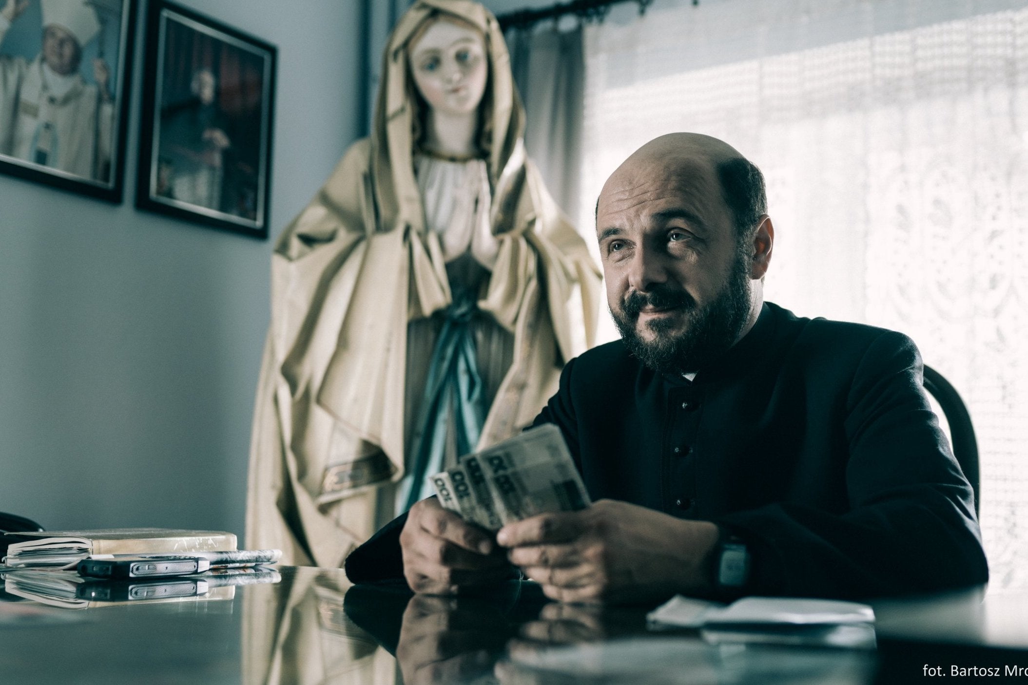 Arkadiusz Jakubik playing a priest in the Polish movie 'Kler', directed by Wojciech Smarzowski