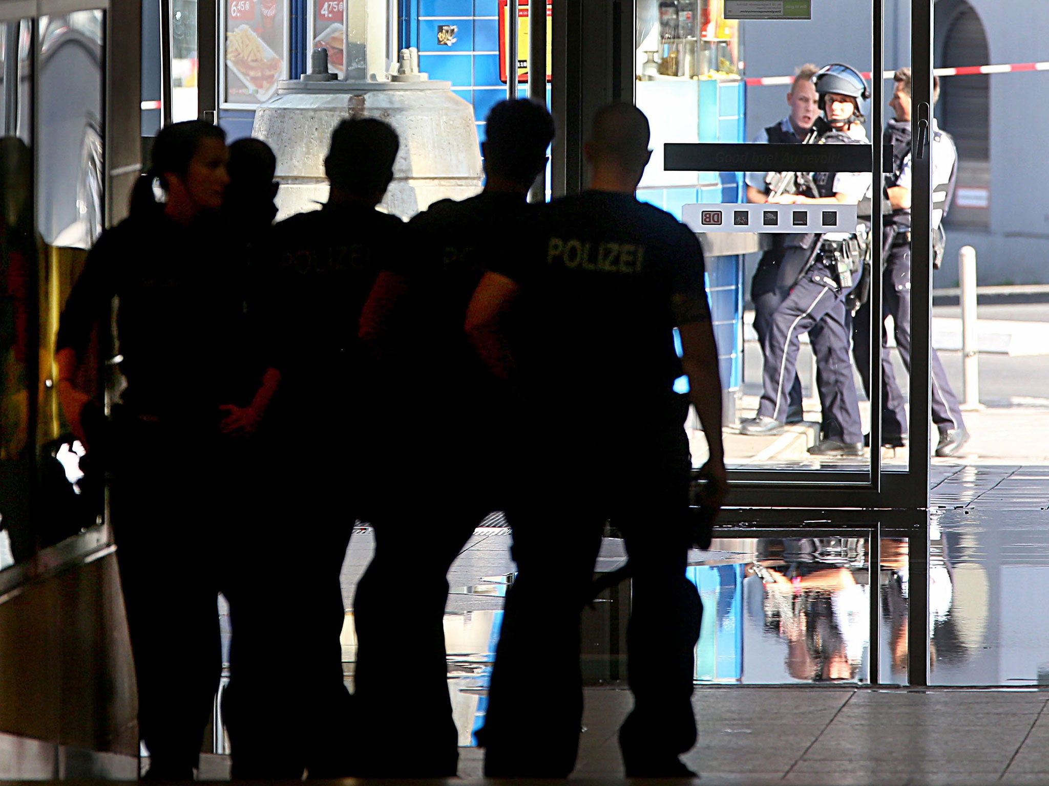 Police officers at Cologne railway station in Germany during a hostage situation on 15 October