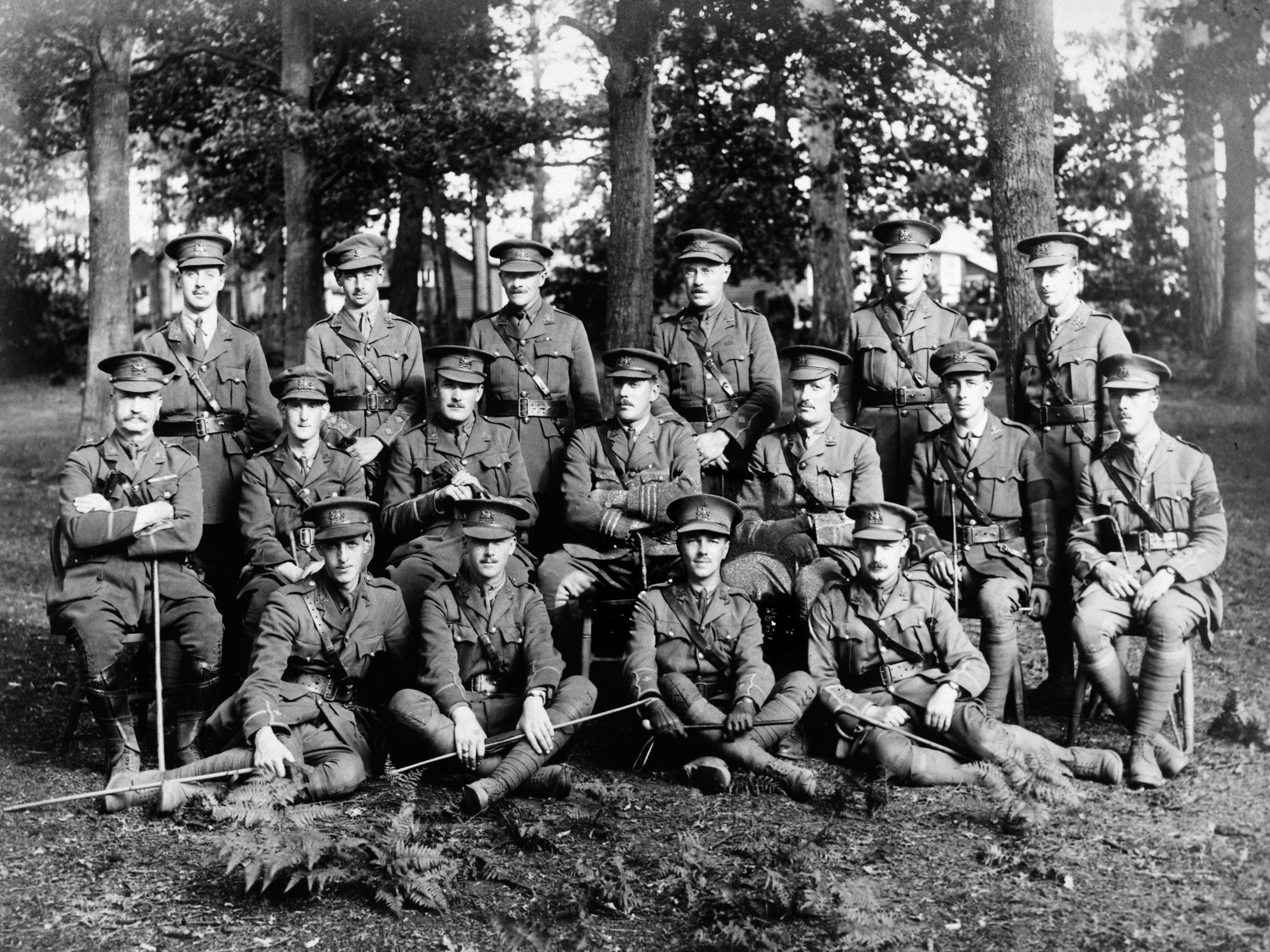 Owen (front row, third from the left) with fellow officer towards the end of the war (Rex)