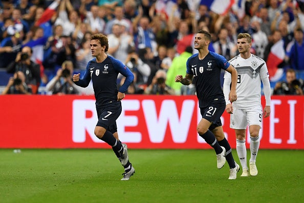 Antoine Griezmann celebrates scoring against Germany in Paris