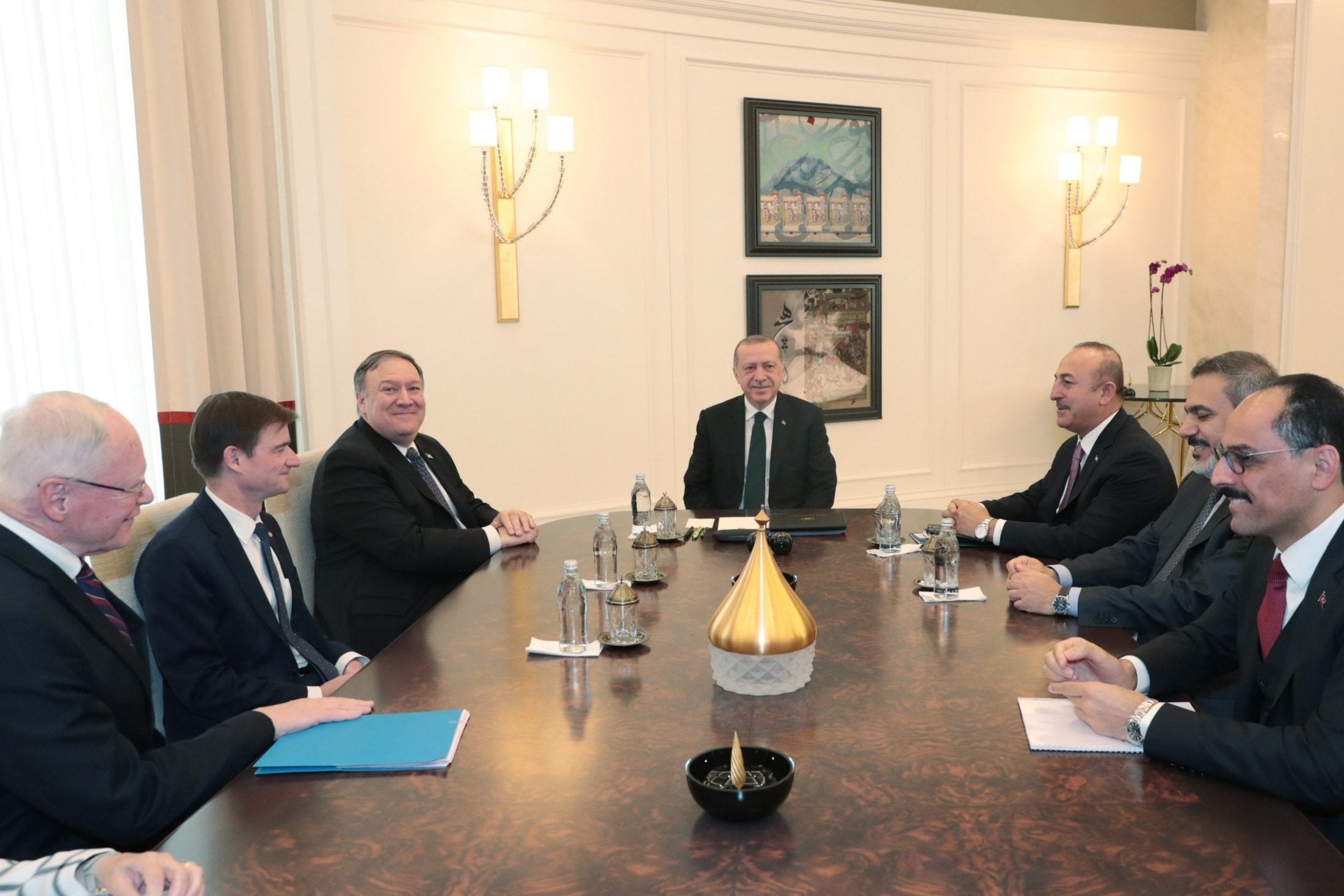 A photo made available by the Turkish Presidential Press Office shows US Secretary of State Mike Pompeo (3-L) during a meeting with Turkish President Recep Tayyip Erdogan (C) and Turkish Foreign Minister Mevlut Cavusoglu (3-R) in Ankara on Wednesday