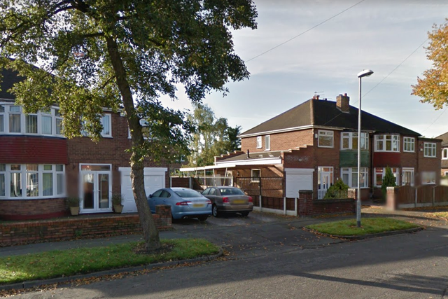 Robbers held a 14-year-old girl at gunpoint during a raid at a family home in Wythenshawe, south Manchester