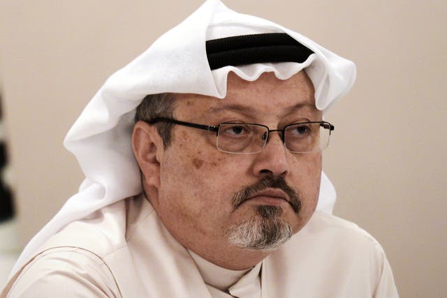 Jamal Khashoggi looks on during a press conference in the Bahraini capital Manama, on 15 December, 2014