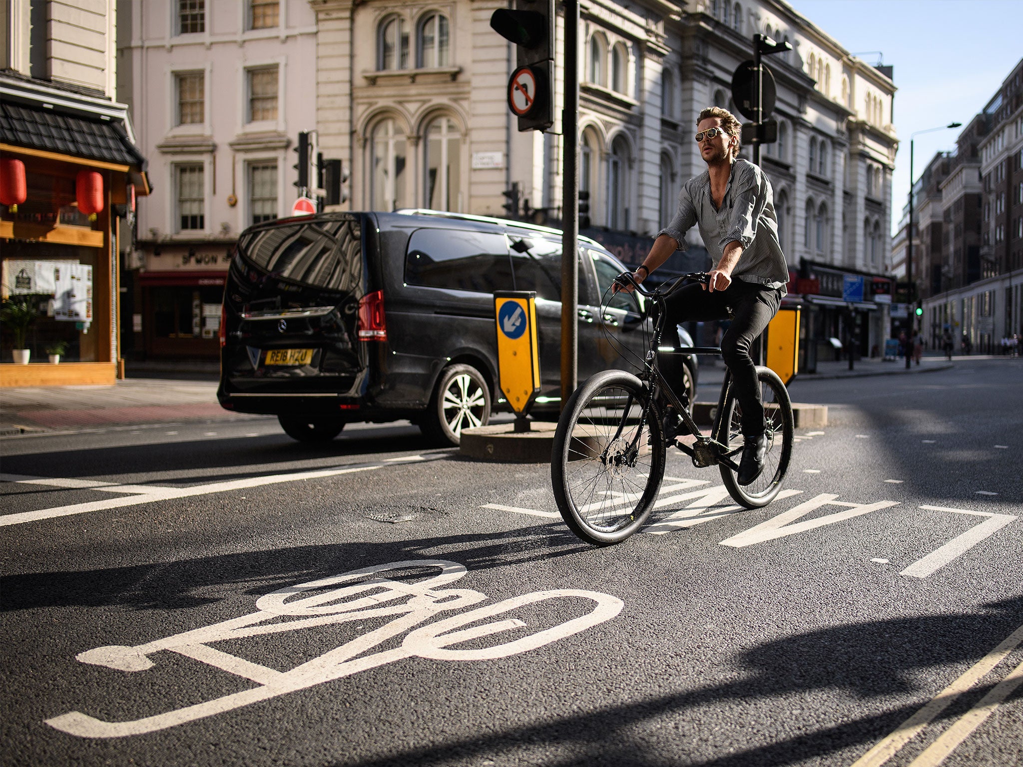 A man cycling in London