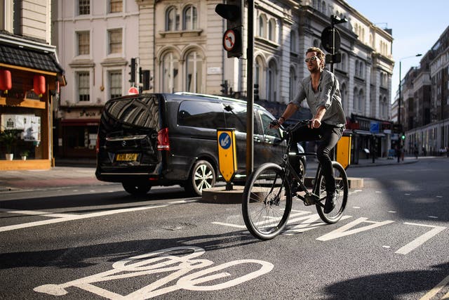 A man cycling in London