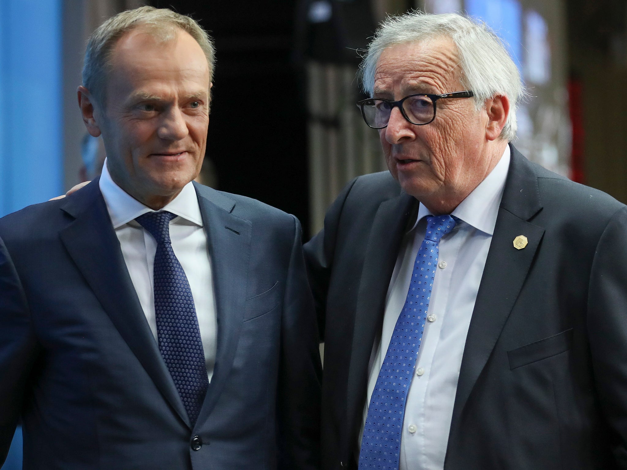 Donald Tusk, here with Jean-Claude Juncker on the right, was seen gesturing dramatically