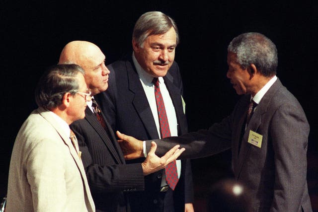 Middle man: Pik Botha between Nelson Mandela and FW De Klerk at the Convention for a Democratic South Africa in Johannesburg in 1992