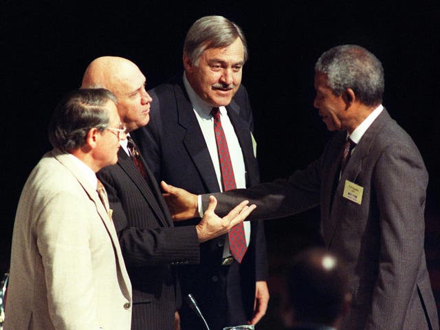 Middle man: Pik Botha between Nelson Mandela and FW De Klerk at the Convention for a Democratic South Africa in Johannesburg in 1992