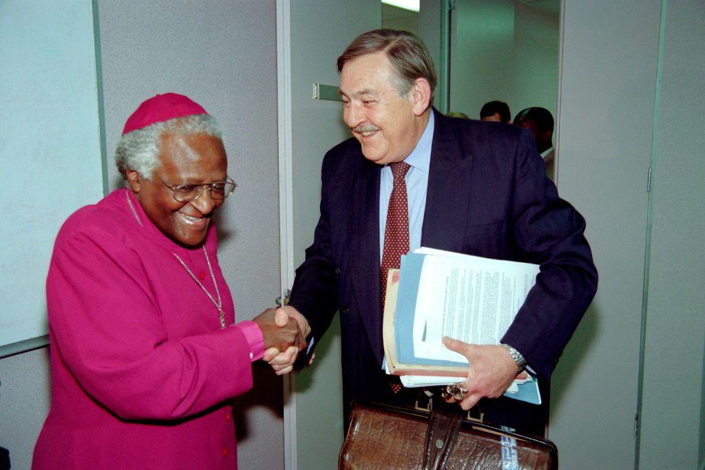 With Archbishop Desmond Tutu, in 1997, at the Truth and Reconciliation Commission hearings in Johannesburg (Getty)