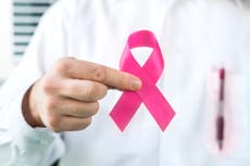 How common is male breast cancer and what are the symptoms?
