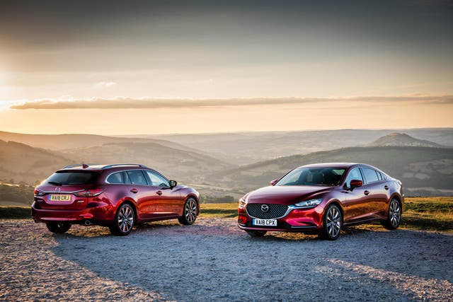 The saloon (left) and Tourer (right) look especially attractive finished in the signature Mazda Soul Red crystal metallic