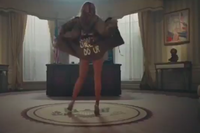 TI's video shows a model dressed as Melania Trump
