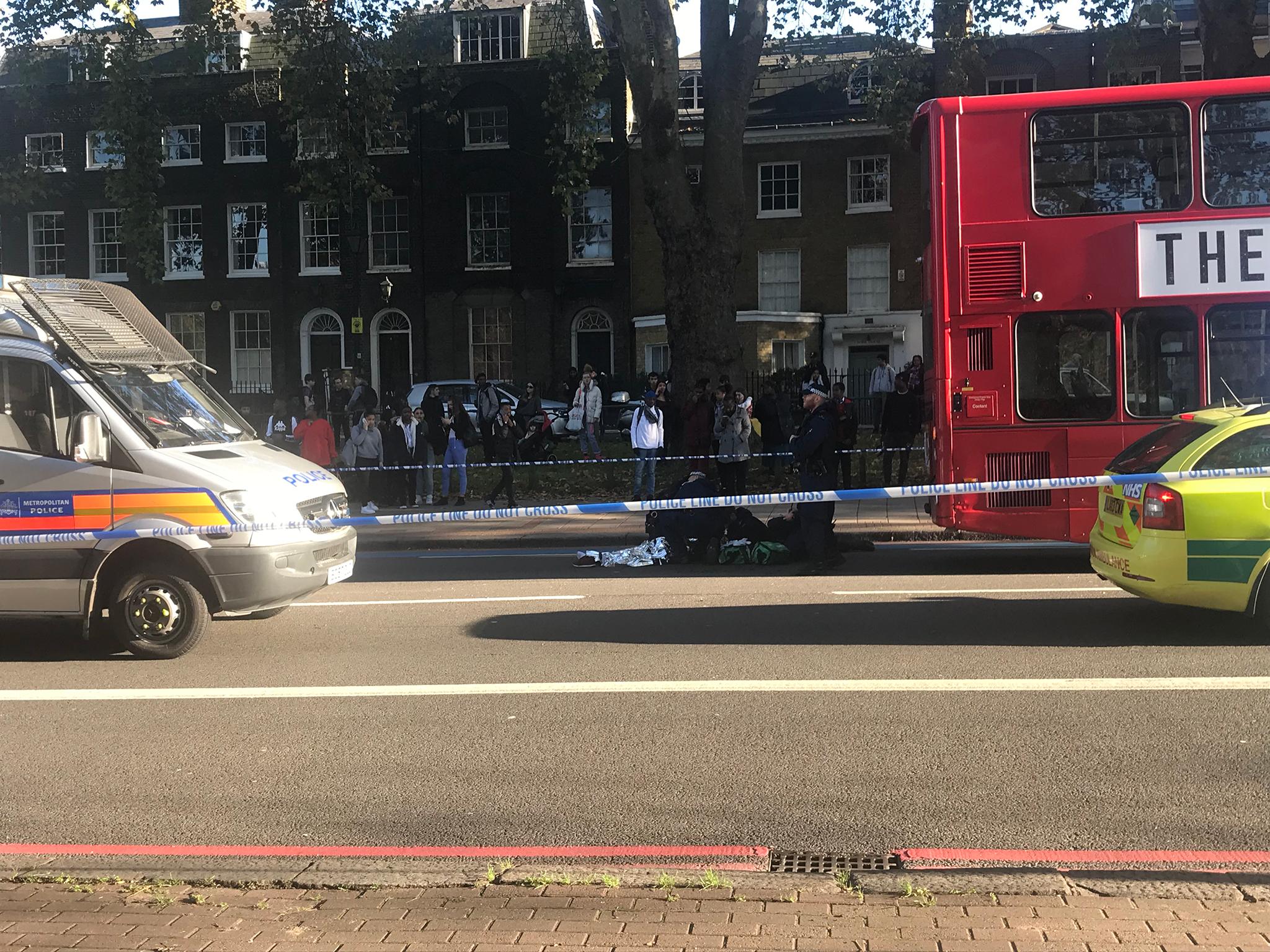 Scene cordoned off as police officers attend to teenager