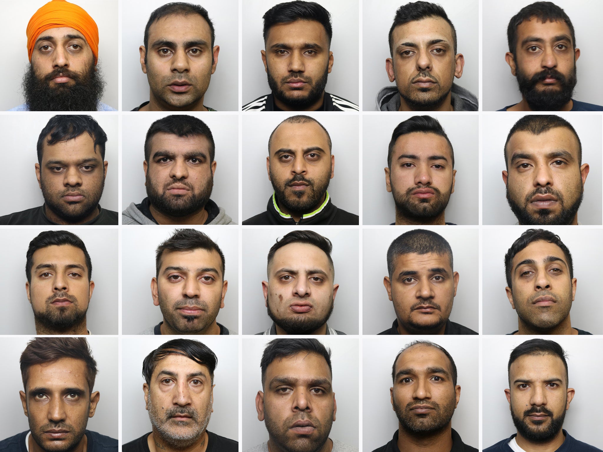 Twenty men have been given long-term jail sentences for abusing teenagers in Huddersfield