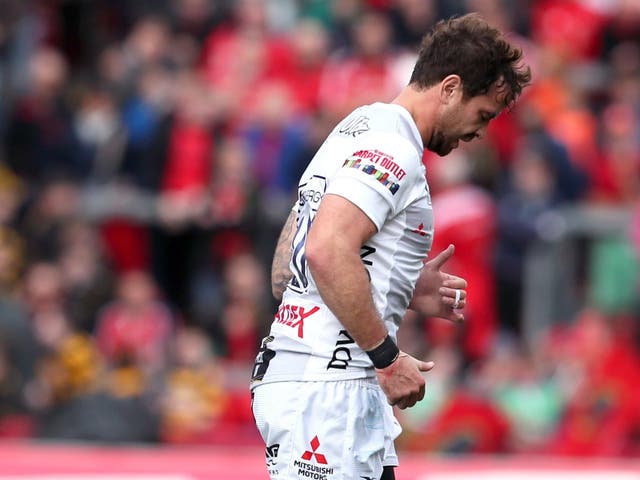 Danny Cipriani jogs off the pitch after being shown a red card