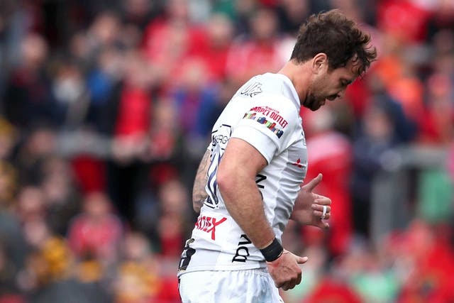 Danny Cipriani jogs off the pitch after being shown a red card
