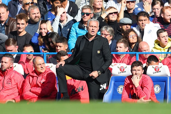 Mourinho raised three fingers to the crowd in references to the titles he won at Chelsea