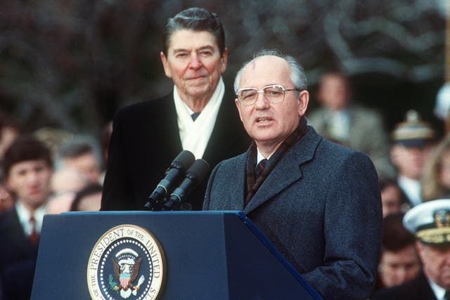 US President Ronald Reagan with Soviet leader Mikhail Gorbachev during signing of the Intermediate-range Nuclear Forces (INF) Treaty in a first attempt to reverse the nuclear arms race on 08 December 1987