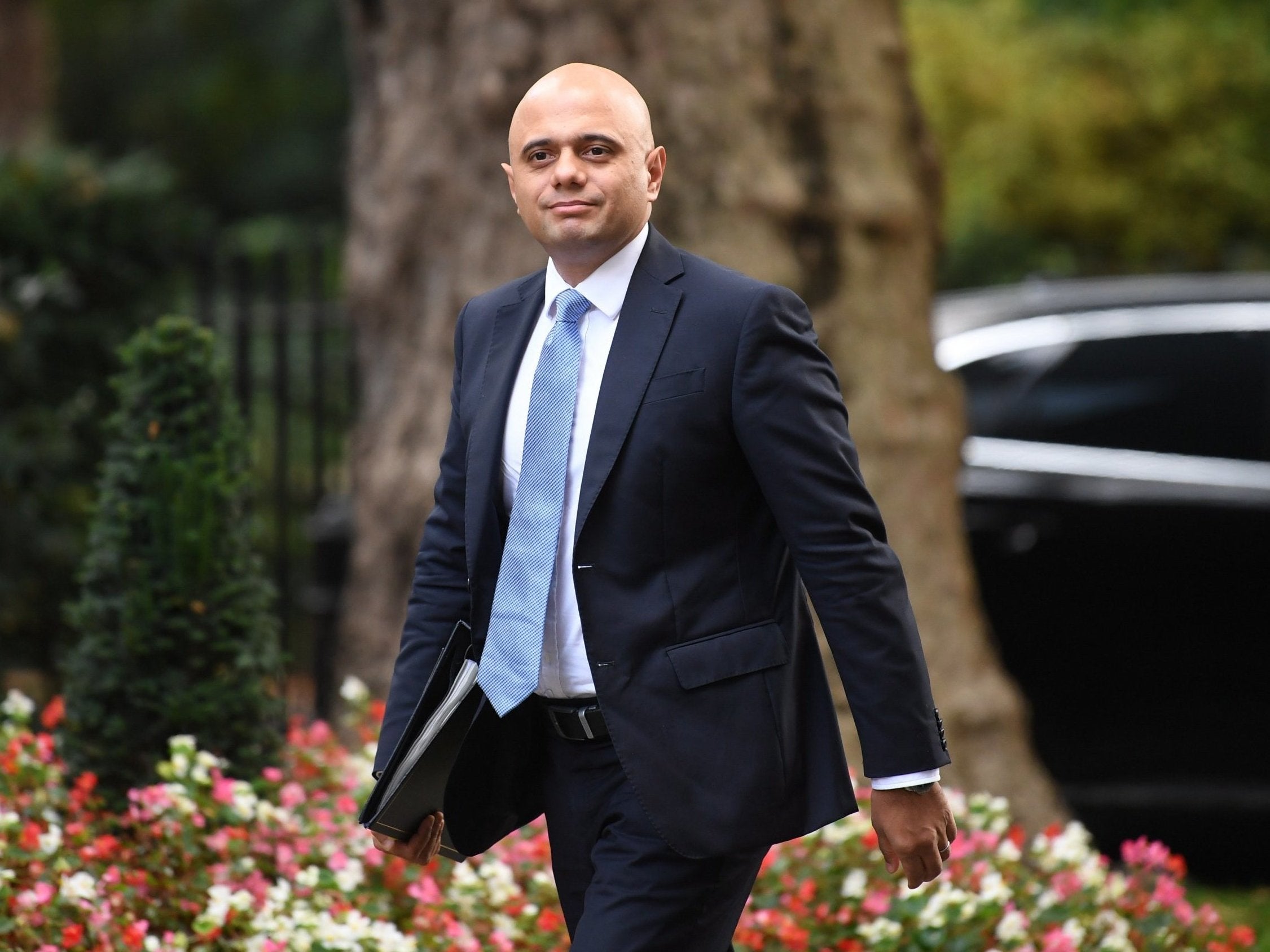 Sajid Javid arrives for a political cabinet meeting at Downing Street in London, Britain