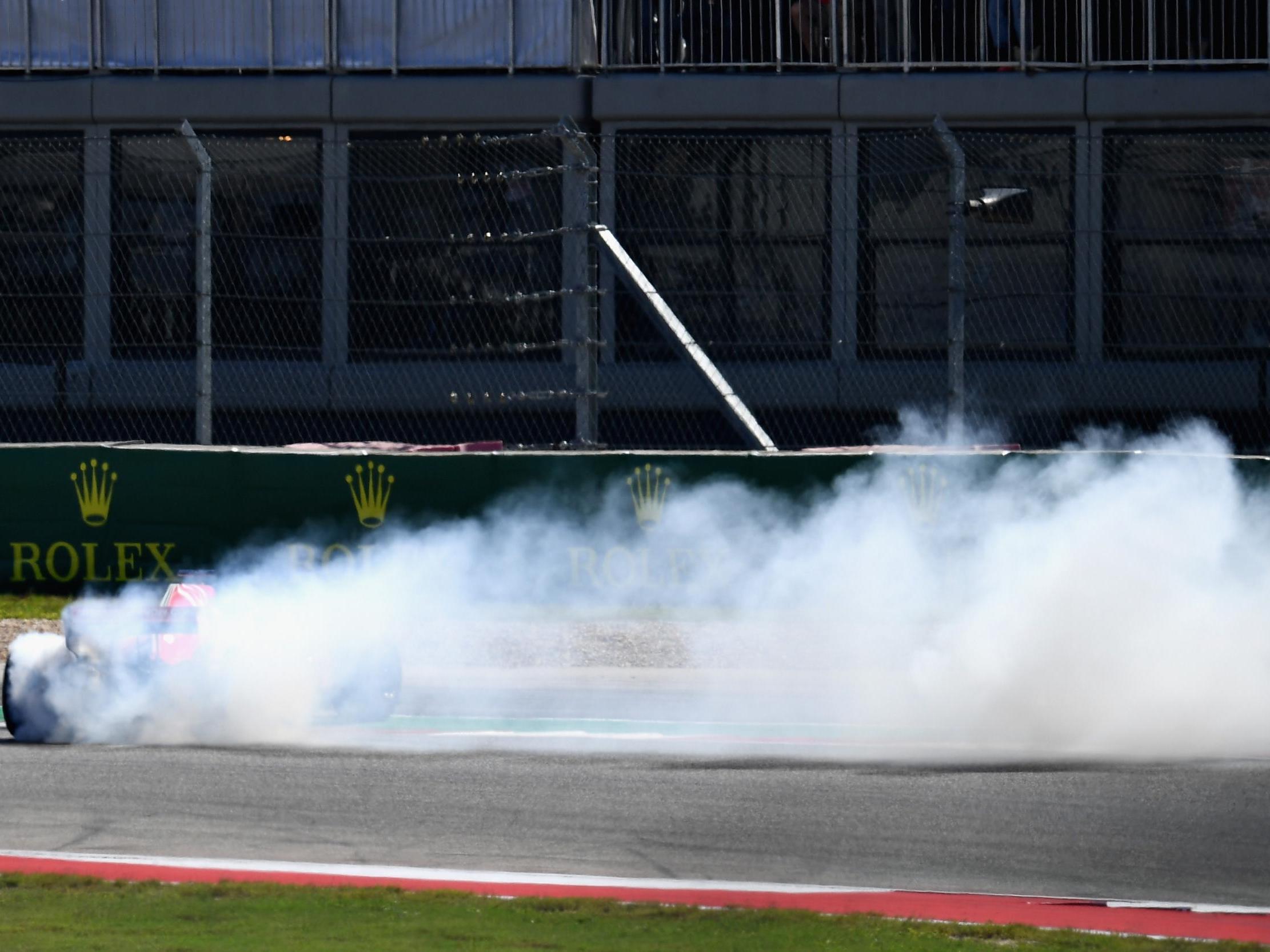 Sebastian Vettel spins on the first lap after hitting Daniel Ricciardo