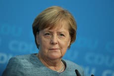 Angela Merkel ‘to quit as party leader but stay on as chancellor’