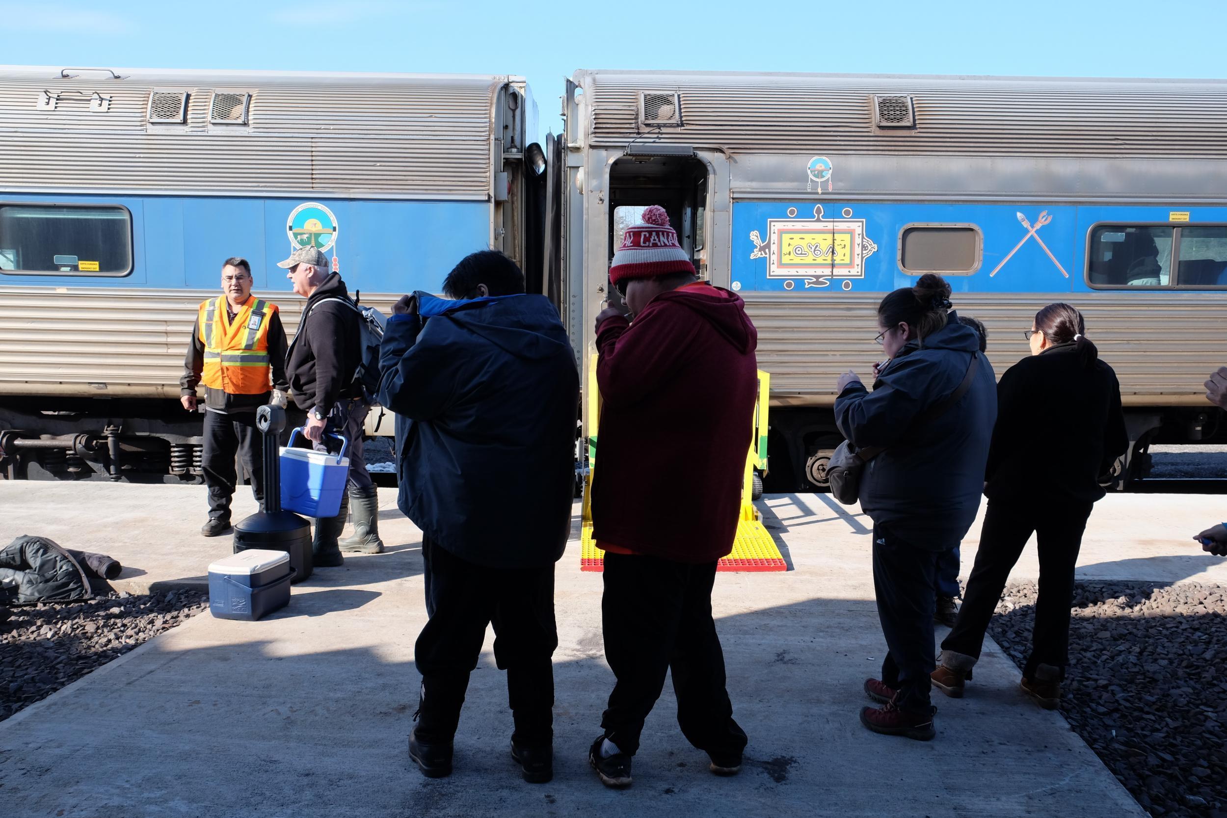 Some passengers gripe about the late-running of the return journey, eager to go back to sleep after an early start