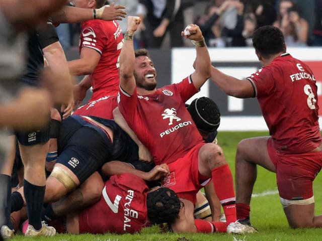 Maxime Medard celebrates scoring Toulouse's match-winning try against Leinster