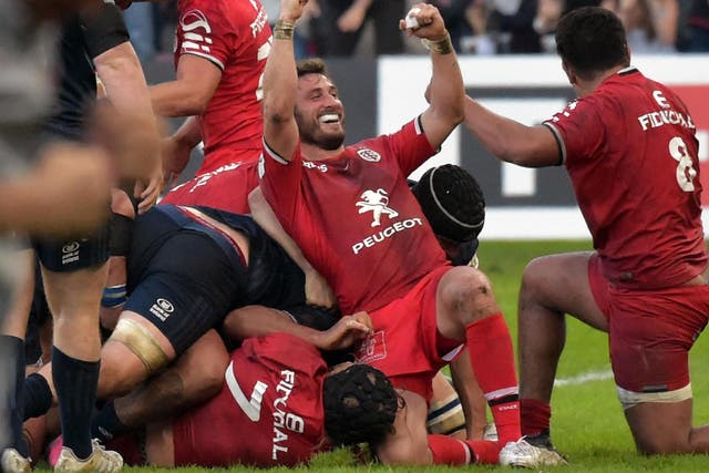 Maxime Medard celebrates scoring Toulouse's match-winning try against Leinster