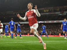 Ozil masterminds Arsenal's thrilling comeback win over Leicester