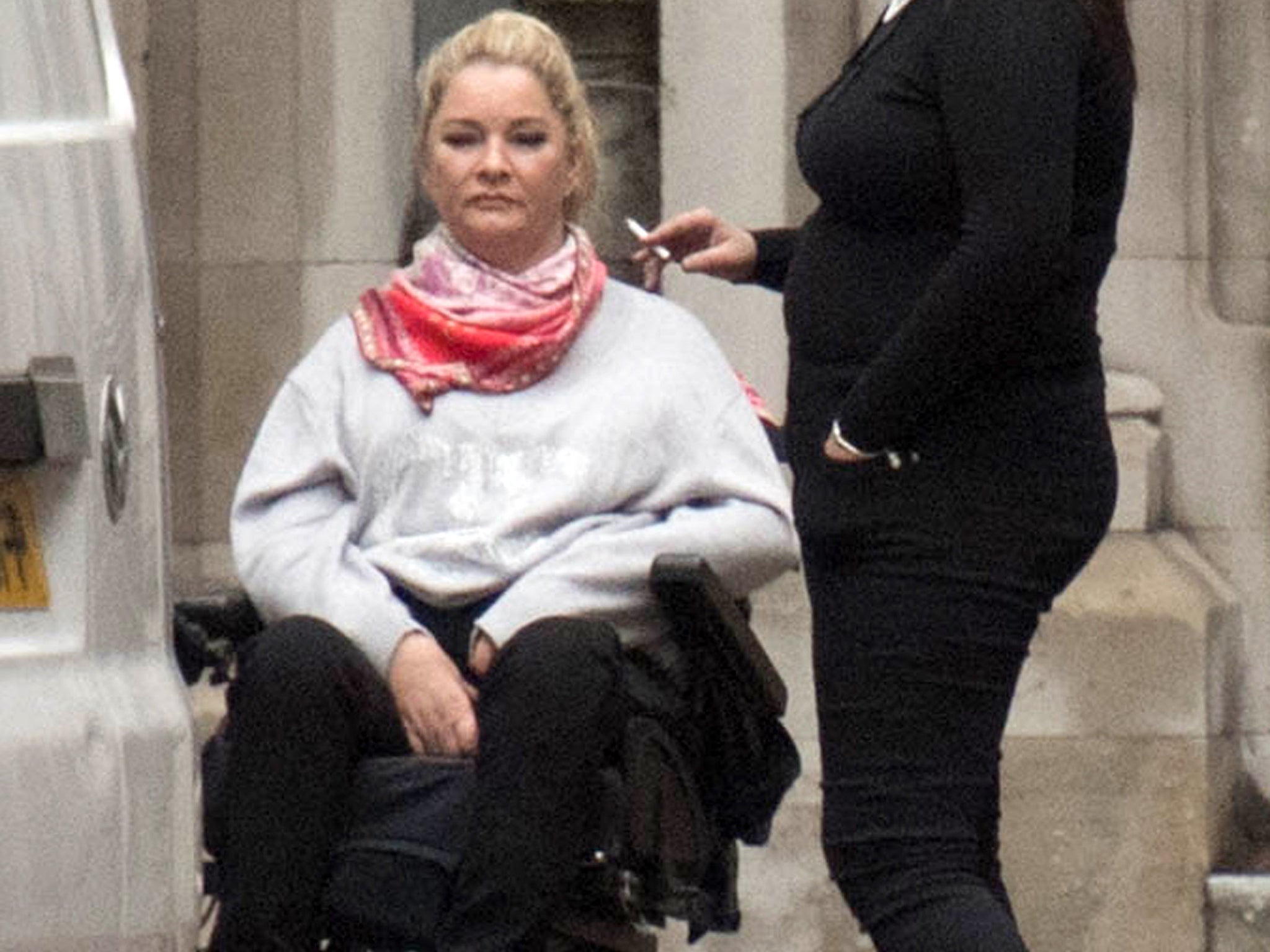 Claire Busby, (left) outside the High Court in London, where she is suing Beds Are Uzzz, for seven-figure damages