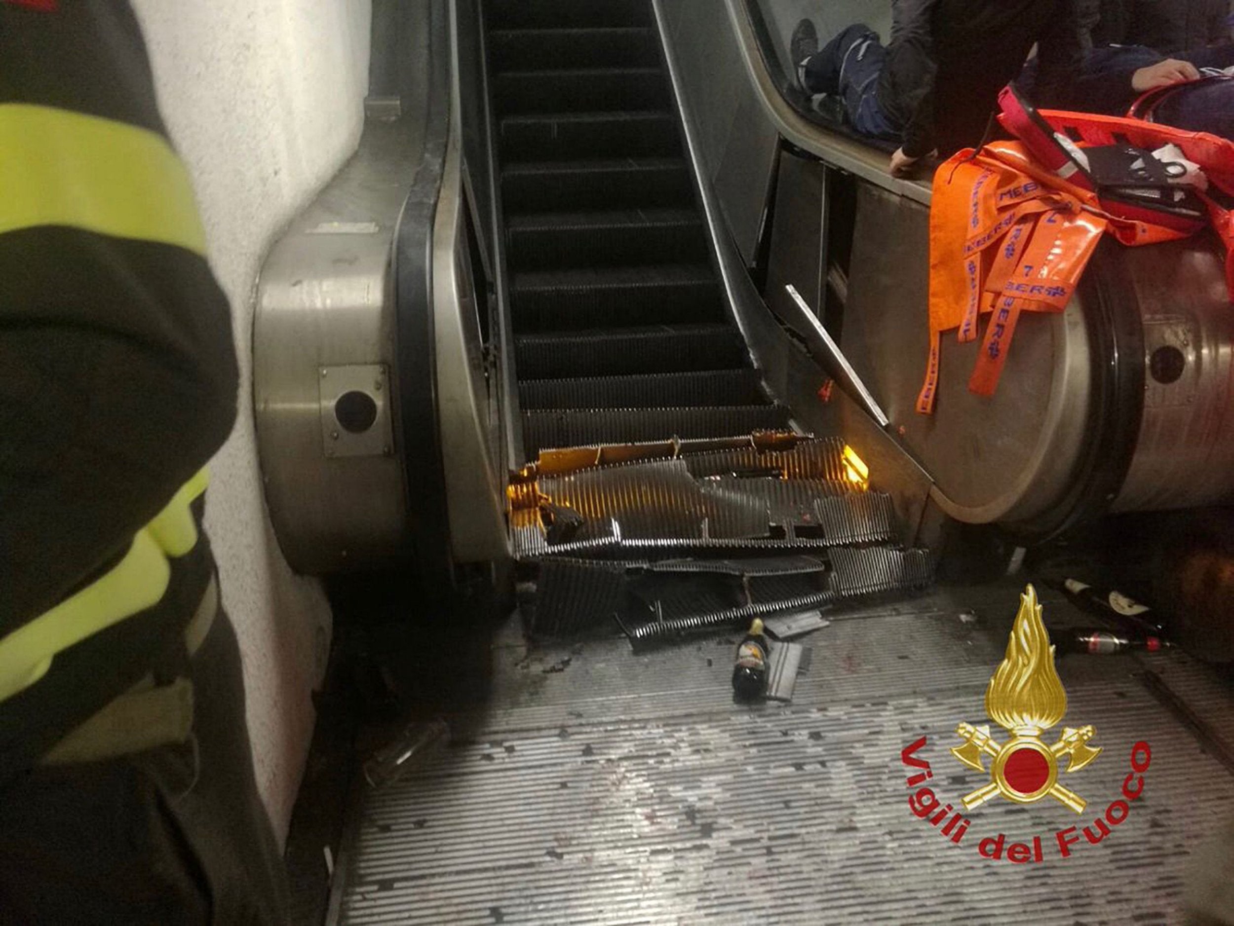 The wreckage of escalator after it jammed at Repubblica metro station in Rome