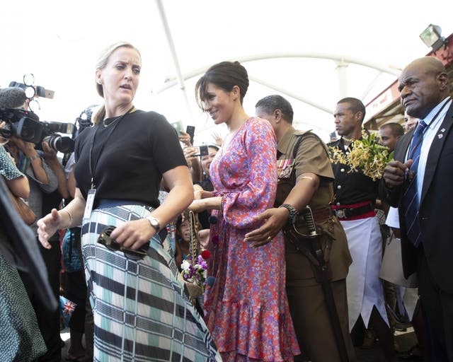 The Duchess of Sussex visiting a market in Fiji during the royal tour