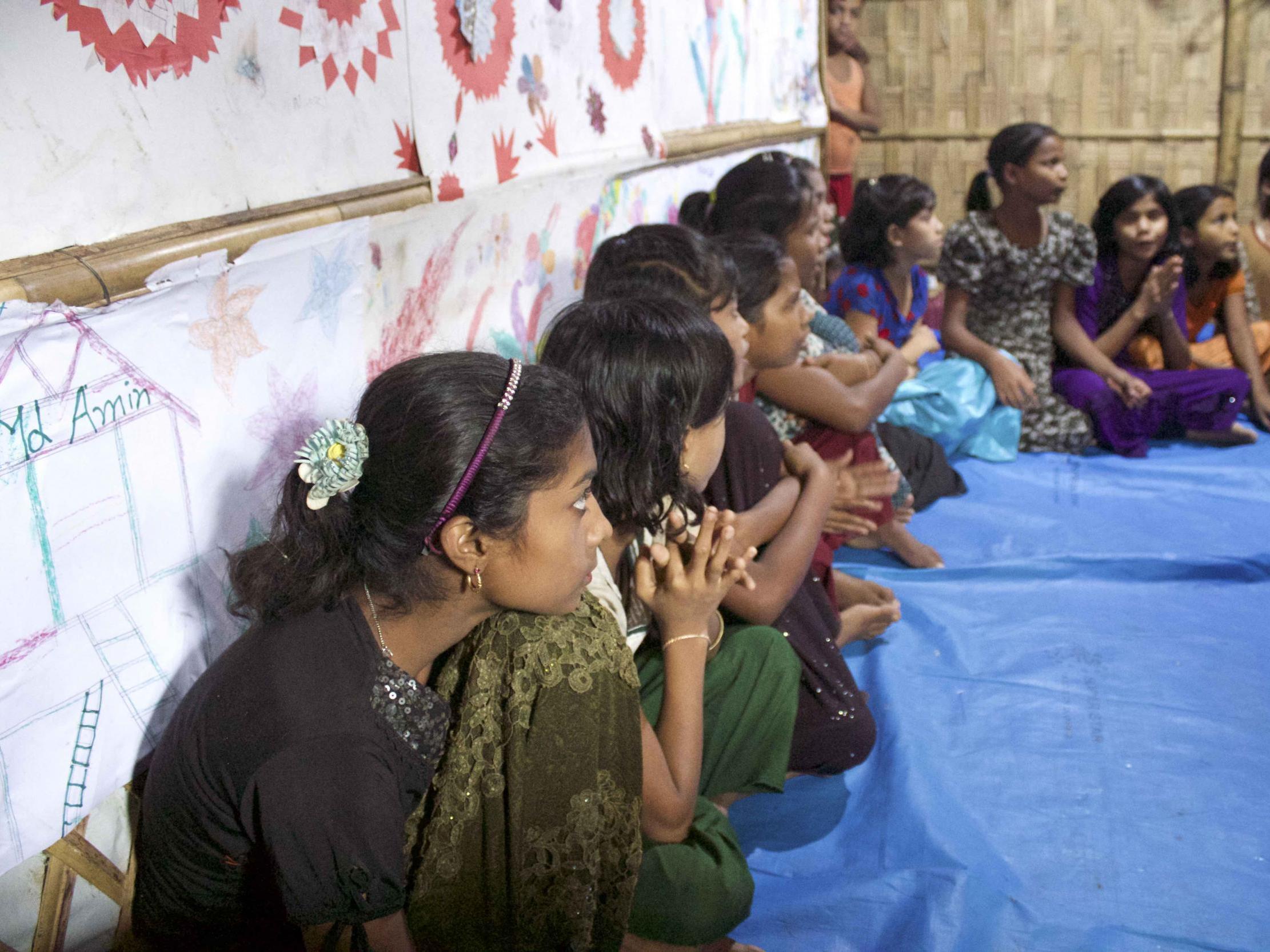 Children over age 12 are taught about forced marriage, sexual consent and other social issues at daily clubs run by Unicef in the refugee camps outside Cox’s Bazar, Bangladesh