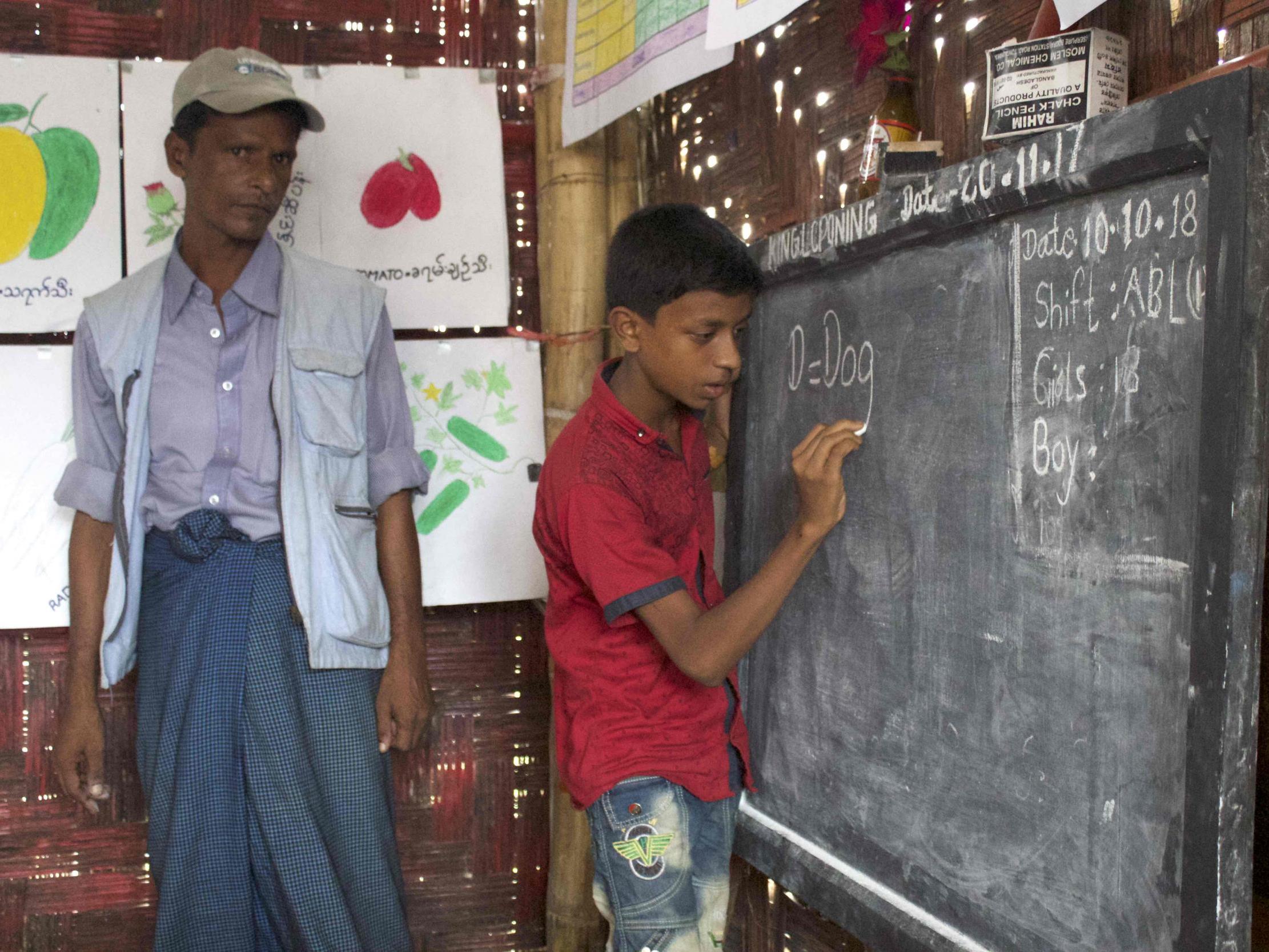 Hashim, 11, is a Rohingya who came to Bangladesh with his family in August last year. He hopes to become a teacher and likes learning English so he can communicate with the world (Adam Withnall)