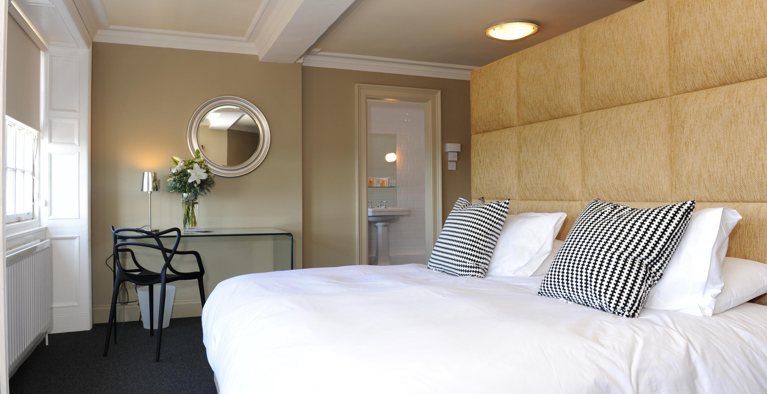 Comfy beds and homely decor at B+B Edinburgh, plus excellent perks like free bikes and afternoon tea