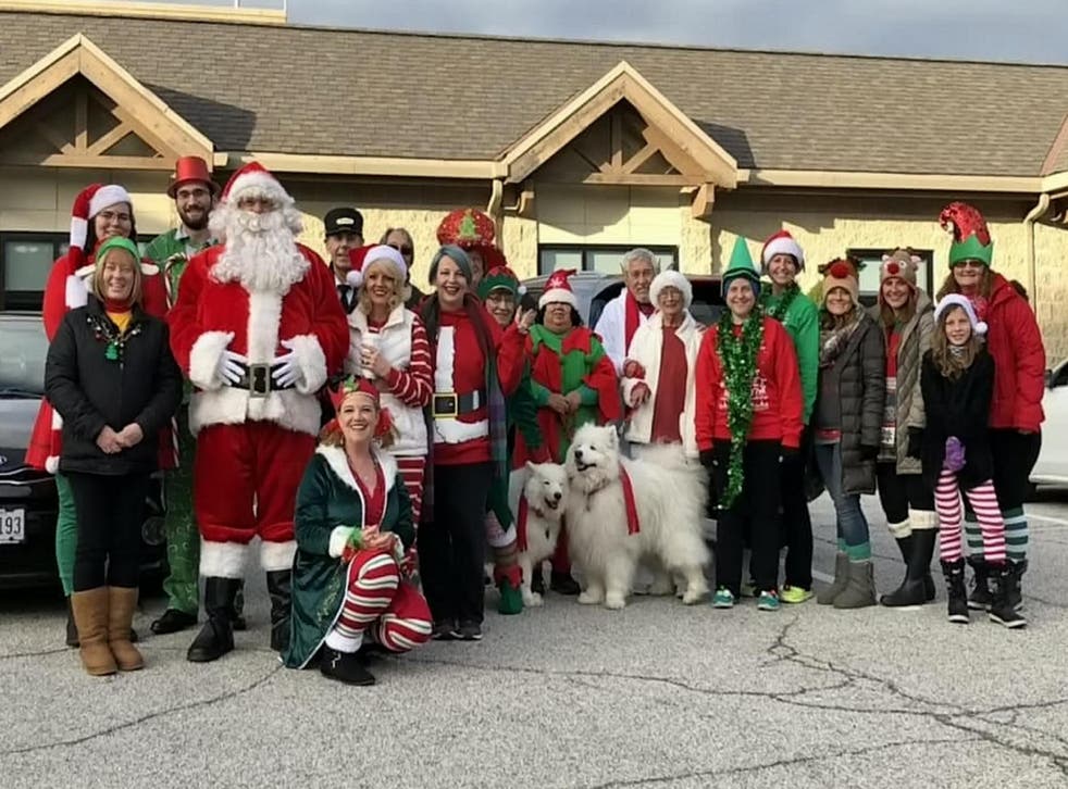 Town celebrates Christmas early for terminally ill boy (SWNS)