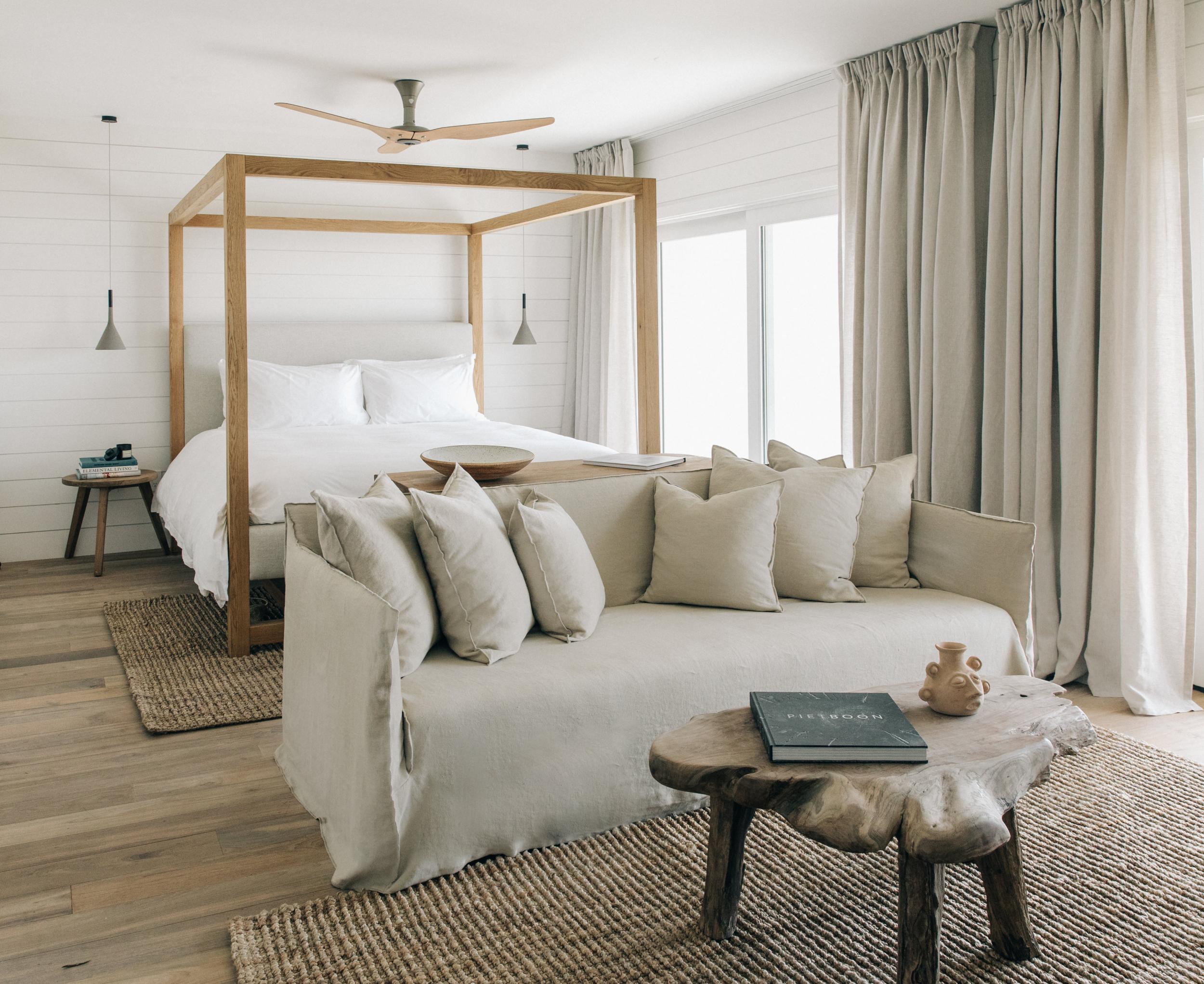 Rooms at the Surfrider Malibu feature an outdoor terrace with loungers, dining area and a hammock