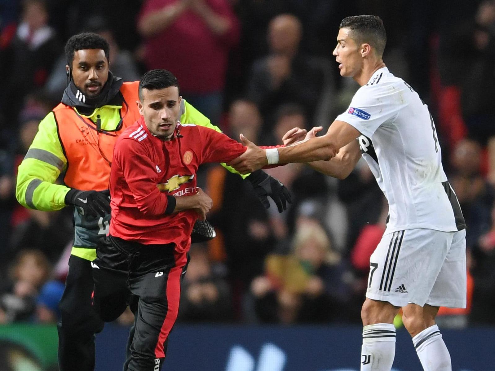 Three pitch invaders attempted to get close to Cristiano Ronaldo
