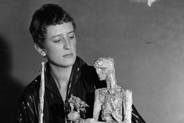 Frink with ‘The Unknown Political Prisoner’, her maquette chosen to represent Great Britain in the International Sculpture Competition of 1953
