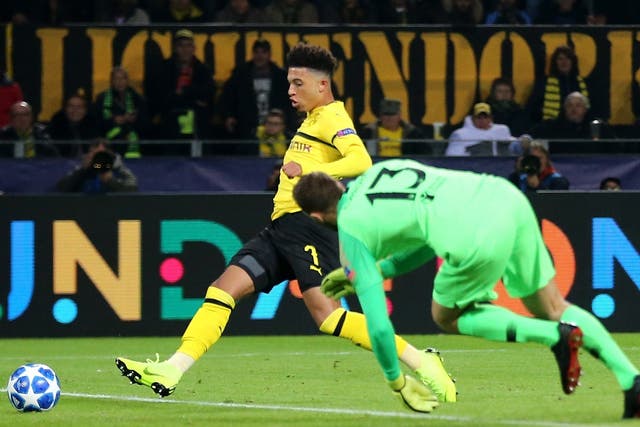 Jadon Sancho scores Dortmund's third goal of the game