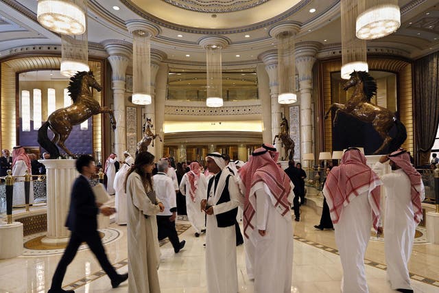 The Saudi delegates, many of them working for state companies, were on message about the regime