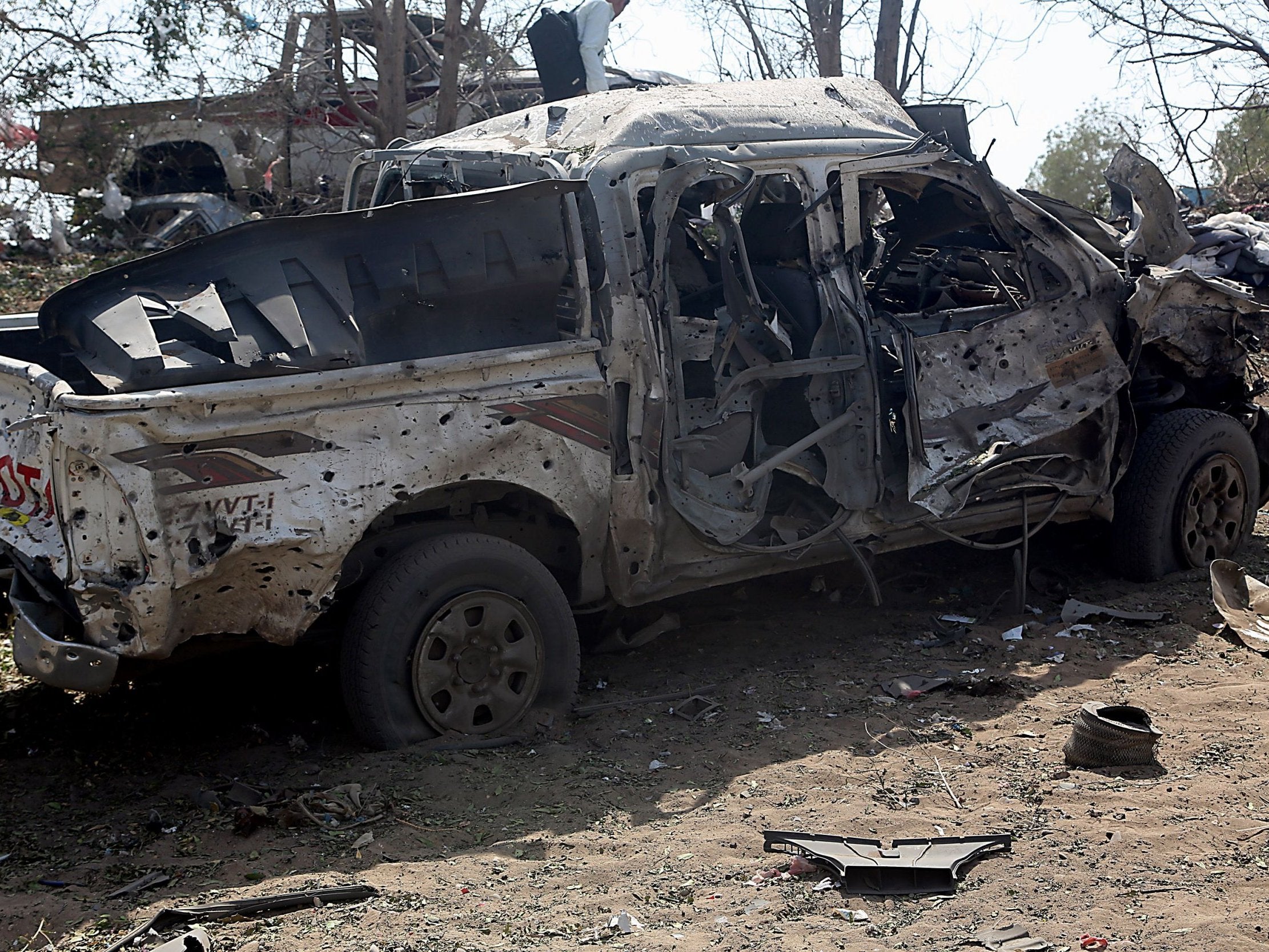 The wreckage of a car reportedly destroyed in an air strike in downtown of Hodeida, 24 October