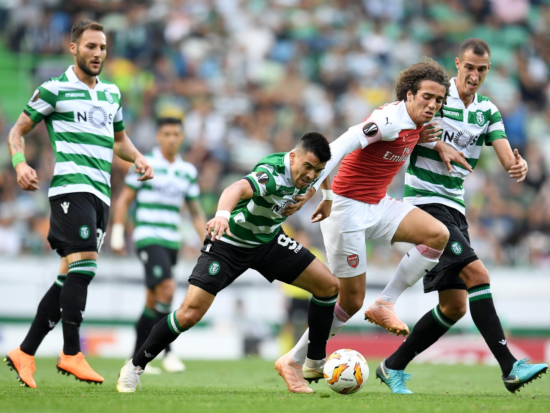 Matteo Guendouzi attempts to wrestle back possession