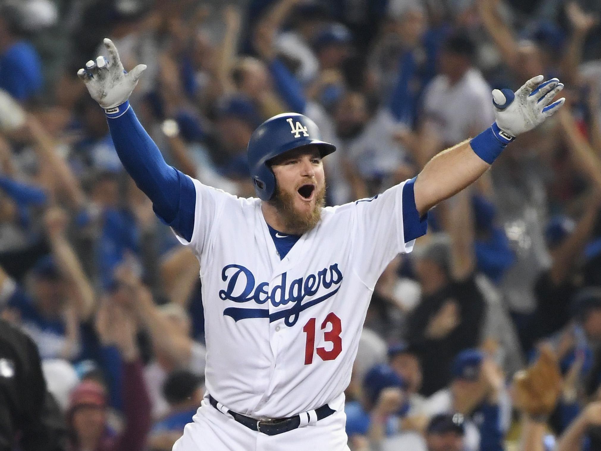 Max Muncy celebrates his eighteenth inning walk-off home run