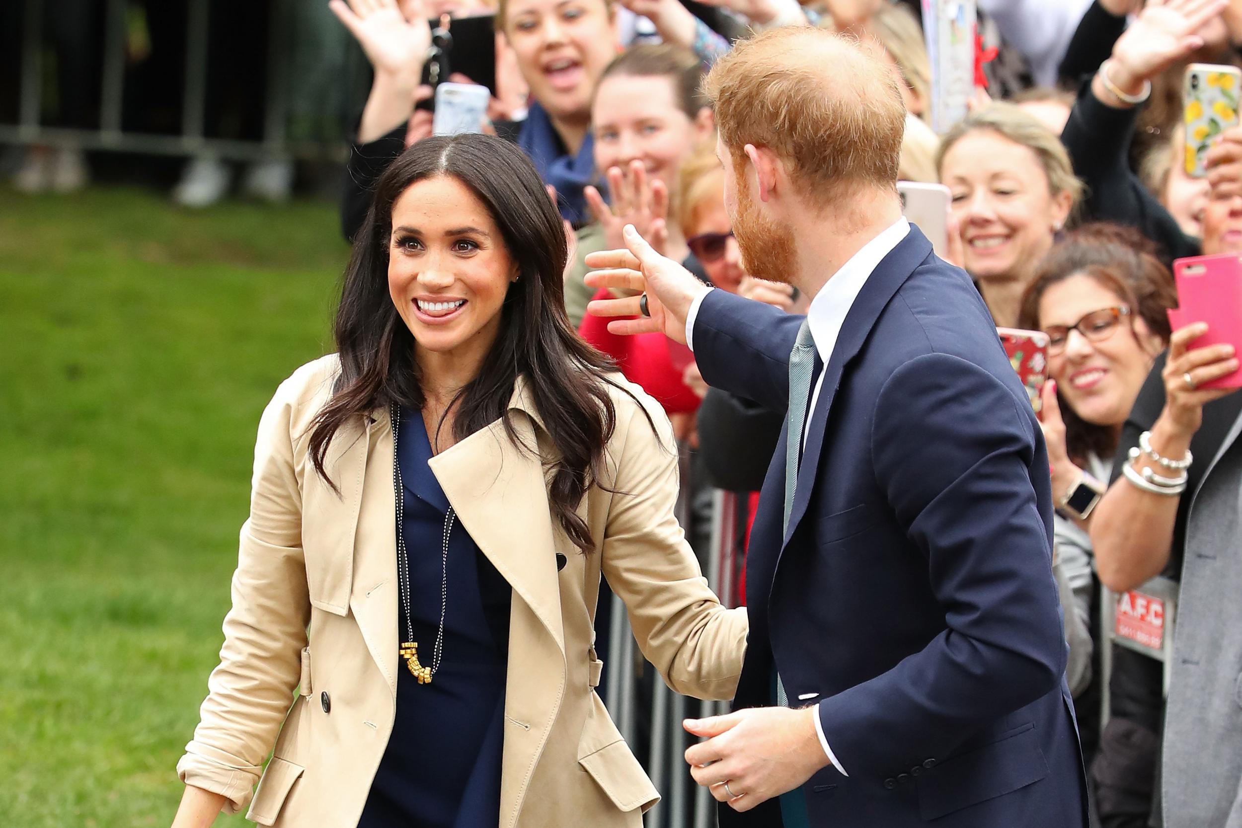The Duchess of Sussex wears a pasta necklace presented to her by six-year-old Gavin Hazelwood while in Melbourne with the Duke of Sussex