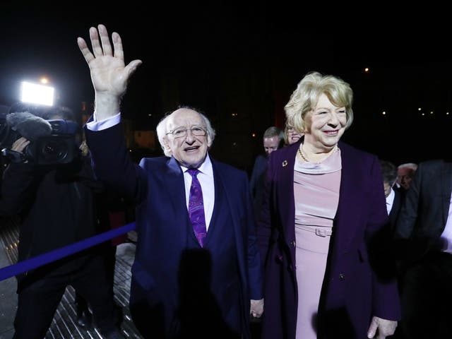 Michael D Higgins and his wife Sabina arrive at Dublin Castle to attend the count in Ireland's presidential election