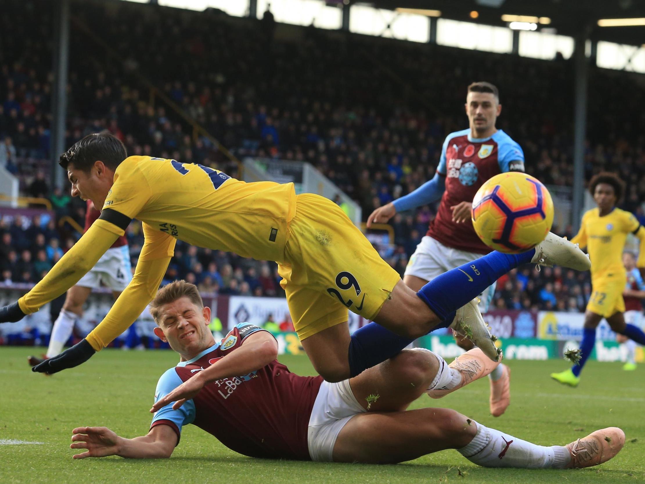 Alvaro Morata puts in a challenge on James Tarkowski