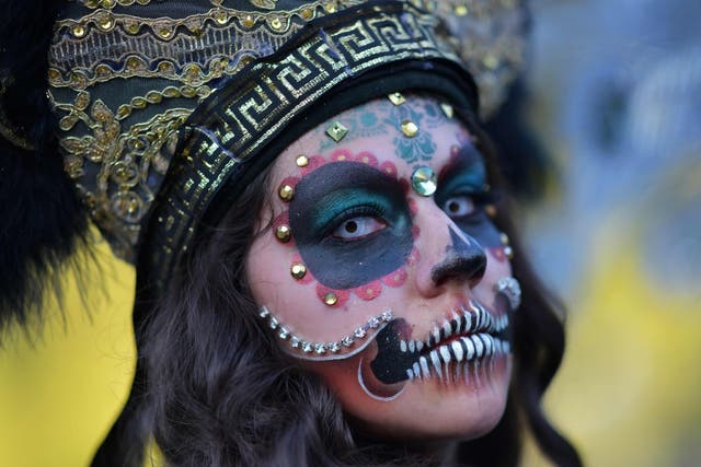 A woman in costume at Hollywood Forever Cemetery's 19th annual Día De Los Muertos event, October 27 2018