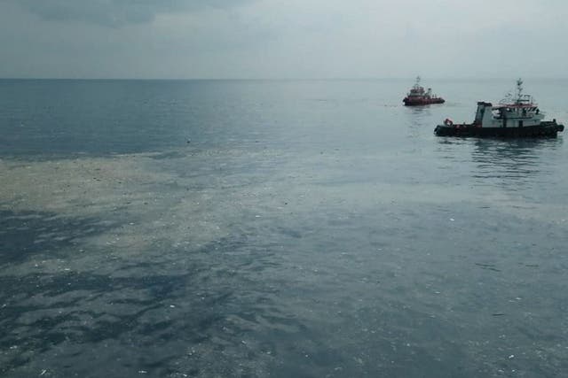An oil slick where flight JT610 reportedly crashed into the sea off the coast of Indonesia’s Java island