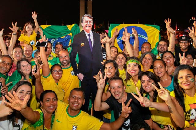 Supporters of far-right president-elect Jair Bolsonaro rejoice in Rio